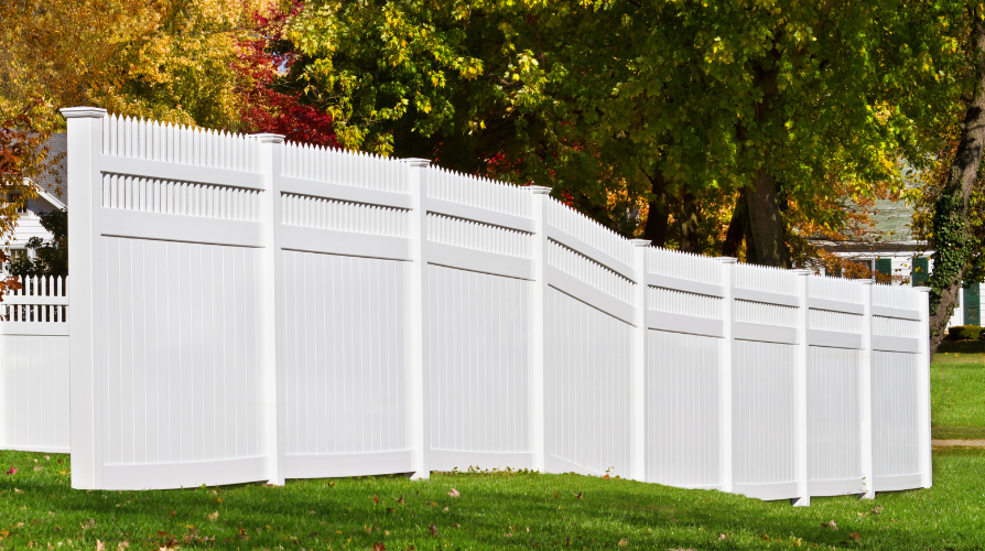 vinyl fencing installed on uneven terrain